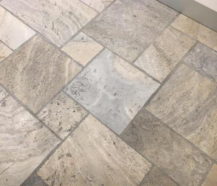 Part of the tile floor cleaning